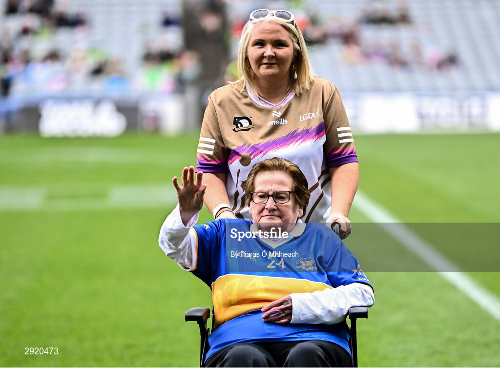 4 August 2024; Alice Morris from Moycarkey, of the Tipperary team of 1974, who won the first All-Ireland Ladies Senior Football Championship final, as they are introduced to the crowd at half-time during the TG4 All-Ireland Ladies Football Intermediate Championship final match between Leitrim and Tyrone at Croke Park in Dublin. Photo by Piaras Ó Mídheach/Sportsfile