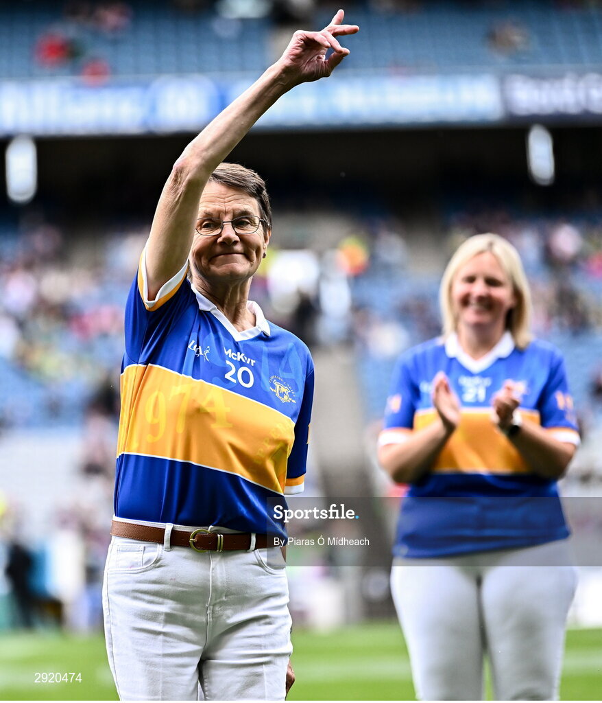 4 August 2024; Ann Bryan, from Moycarkey, of the Tipperary team of 1974, who won the first All-Ireland Ladies Senior Football Championship final, as they are introduced to the crowd at half-time during the TG4 All-Ireland Ladies Football Intermediate Championship final match between Leitrim and Tyrone at Croke Park in Dublin. Photo by Piaras Ó Mídheach/Sportsfile