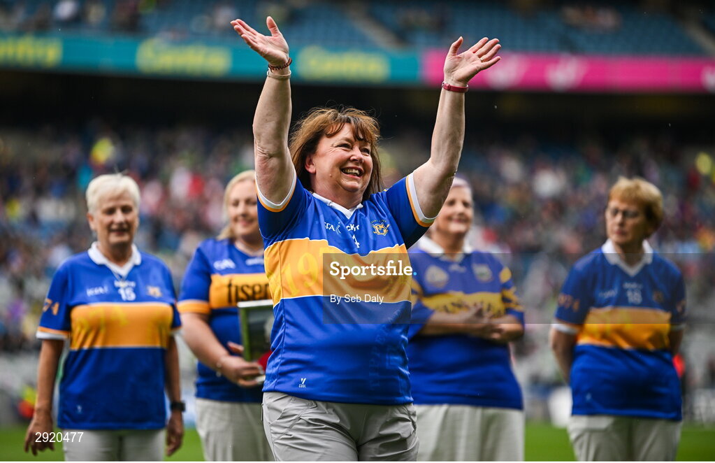 4 August 2024; Josie Keane, from Mullinahone, of the Tipperary team of 1974, who won the first All-Ireland Ladies Senior Football Championship final, as they are introduced to the crowd at half-time during the TG4 All-Ireland Ladies Football Intermediate Championship final match between Leitrim and Tyrone at Croke Park in Dublin. Photo by Seb Daly/Sportsfile