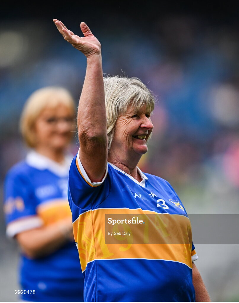 4 August 2024; Ann Clohessy from Moycarkey, of the Tipperary team of 1974, who won the first All-Ireland Ladies Senior Football Championship final, as they are introduced to the crowd at half-time during the TG4 All-Ireland Ladies Football Intermediate Championship final match between Leitrim and Tyrone at Croke Park in Dublin. Photo by Seb Daly/Sportsfile