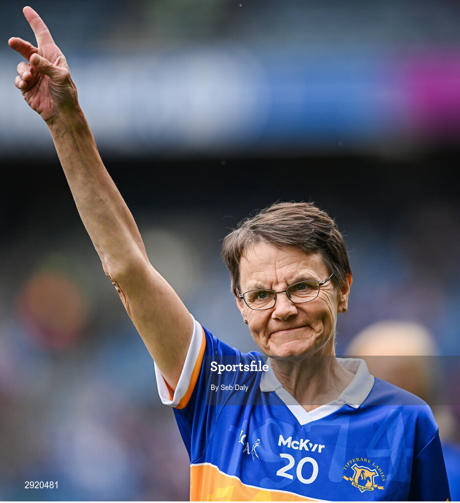 4 August 2024; Ann Bryan, from Moycarkey, of the Tipperary team of 1974, who won the first All-Ireland Ladies Senior Football Championship final, as they are introduced to the crowd at half-time during the TG4 All-Ireland Ladies Football Intermediate Championship final match between Leitrim and Tyrone at Croke Park in Dublin. Photo by Seb Daly/Sportsfile