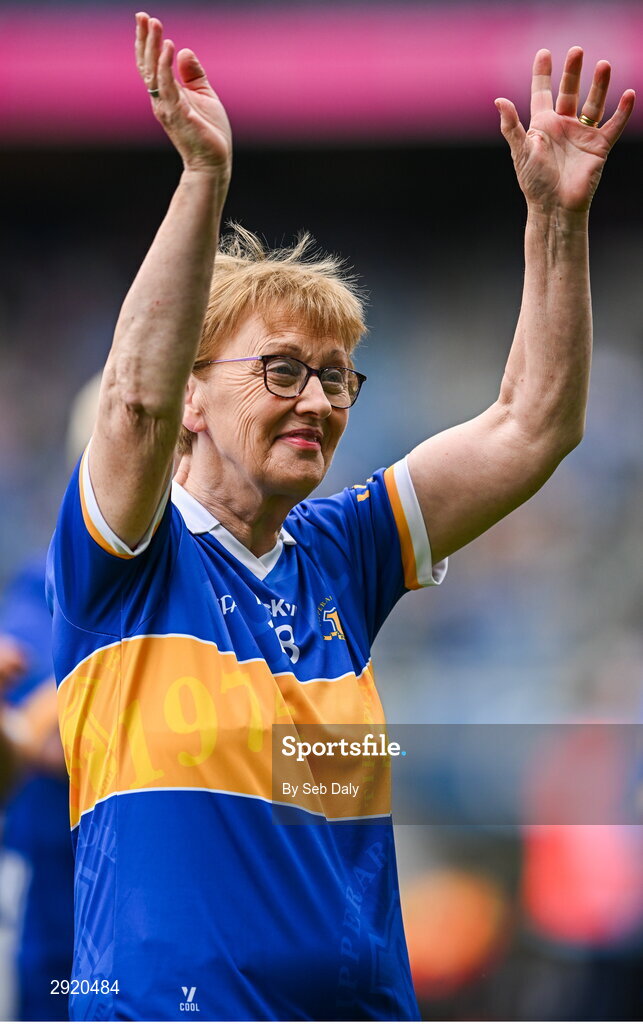 4 August 2024; Mary Burke, from Emly, of the Tipperary team of 1974, who won the first All-Ireland Ladies Senior Football Championship final, as they are introduced to the crowd at half-time during the TG4 All-Ireland Ladies Football Intermediate Championship final match between Leitrim and Tyrone at Croke Park in Dublin. Photo by Seb Daly/Sportsfile