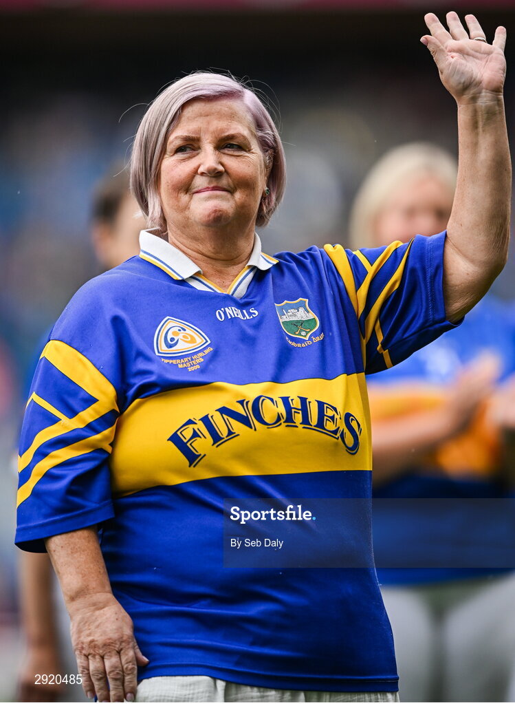 4 August 2024;  Ena Hackett from Newcastle, represented today by her relative, Mary Strappe, of the Tipperary team of 1974, who won the first All-Ireland Ladies Senior Football Championship final, as they are introduced to the crowd at half-time during the TG4 All-Ireland Ladies Football Intermediate Championship final match between Leitrim and Tyrone at Croke Park in Dublin. Photo by Seb Daly/Sportsfile