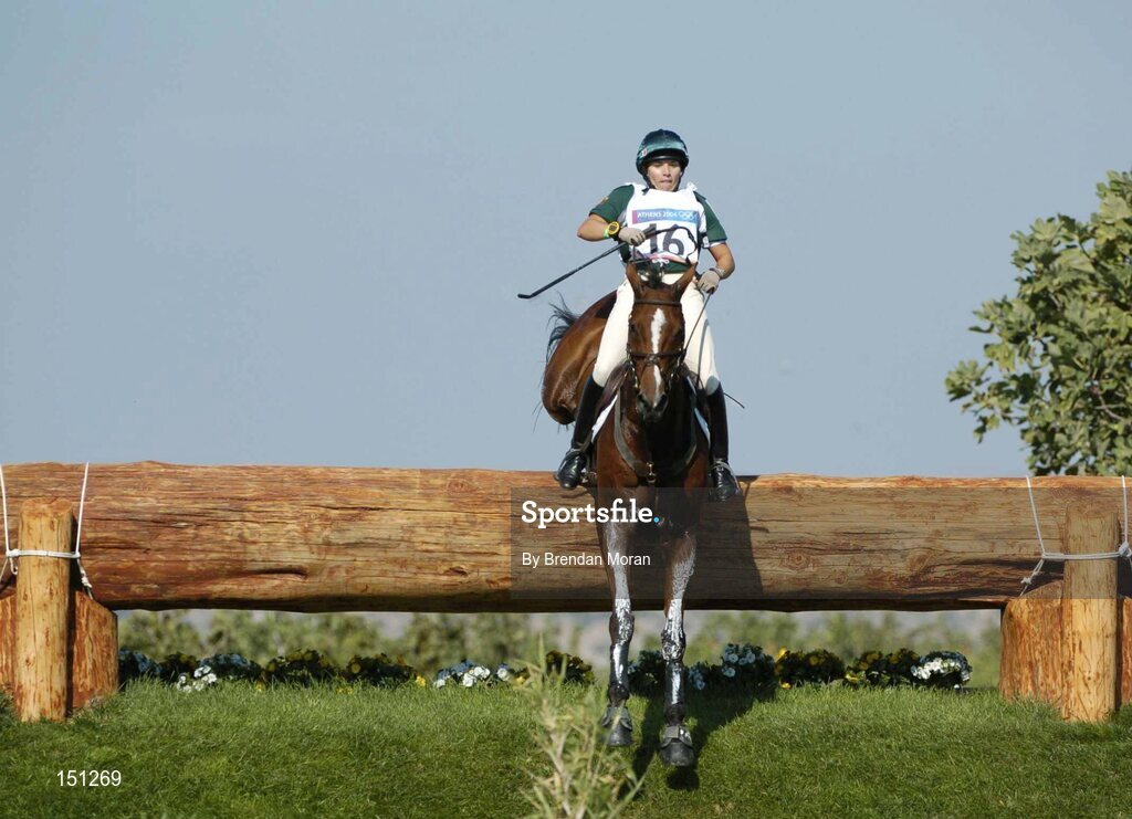 17 August 2004; Ireland's Sasha Harrison, on All Love Du Fenaud, clears the fence at the water jump, during the Cross Country discipline of the 3 Day Eventing Competition. Markopoulo Olympic Equestrian Centre. Games of the XXVIII Olympiad, Athens Summer Olympics Games 2004, Athens, Greece. Picture credit; Brendan Moran / SPORTSFILE