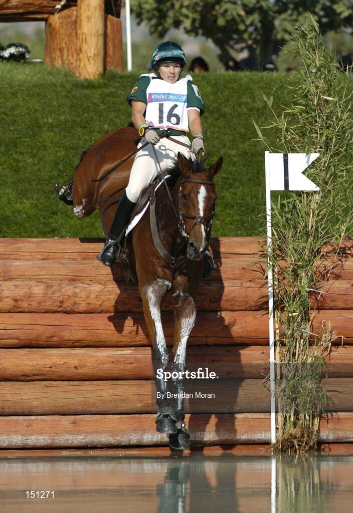17 August 2004; Ireland's Sasha Harrison, on All Love Du Fenaud, at the water jump during the Cross Country discipline of the 3 Day Eventing Competition. Markopoulo Olympic Equestrian Centre. Games of the XXVIII Olympiad, Athens Summer Olympics Games 2004, Athens, Greece. Picture credit; Brendan Moran / SPORTSFILE