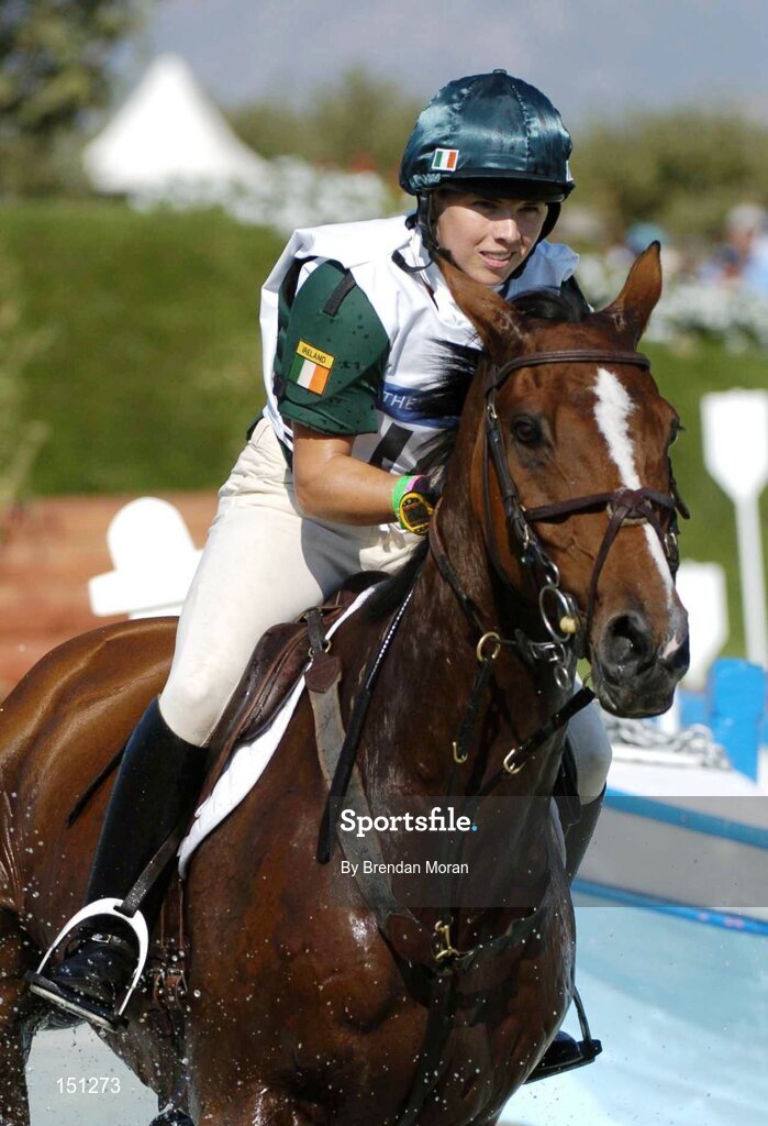 17 August 2004; Ireland's Sasha Harrison, on All Love Du Fenaud, at the water jump during the Cross Country discipline of the 3 Day Eventing Competition. Markopoulo Olympic Equestrian Centre. Games of the XXVIII Olympiad, Athens Summer Olympics Games 2004, Athens, Greece. Picture credit; Brendan Moran / SPORTSFILE