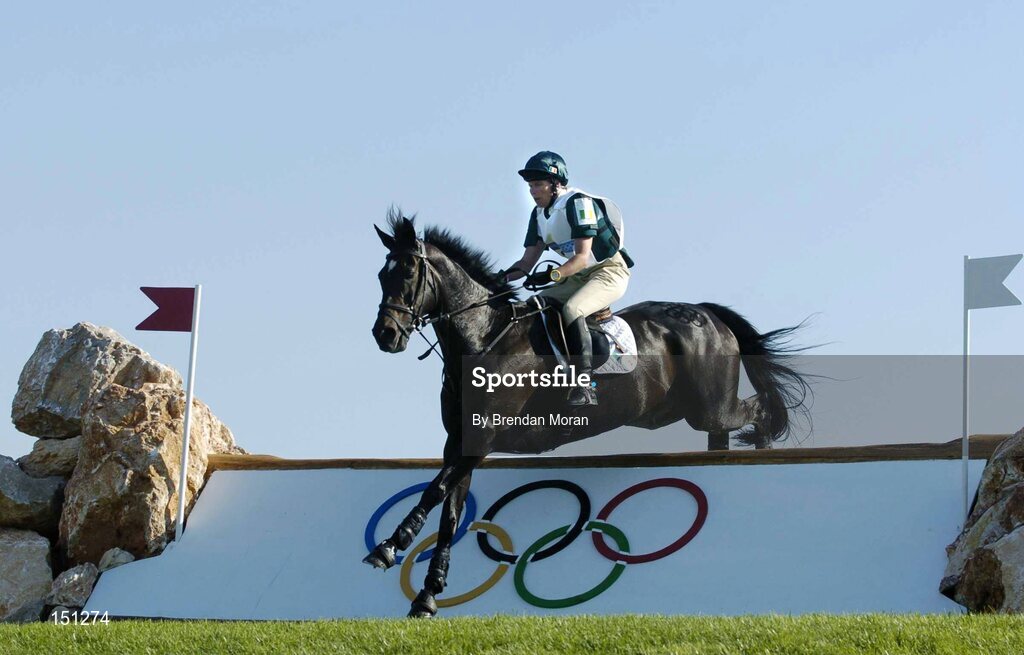 17 August 2004; Ireland's Susan Shortt, on Just Beauty Queen, clears the 30th fence during the Cross Country discipline of the 3 Day Eventing Competition. Markopoulo Olympic Equestrian Centre. Games of the XXVIII Olympiad, Athens Summer Olympics Games 2004, Athens, Greece. Picture credit; Brendan Moran / SPORTSFILE