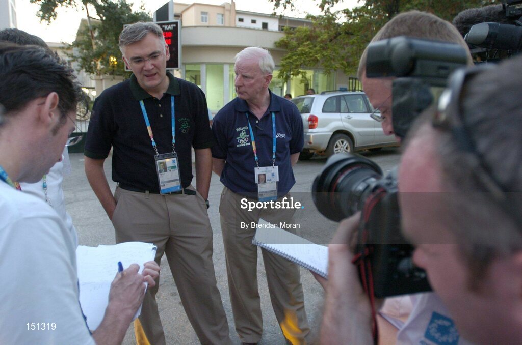 17 August 2004; Dr. Sean Gaine, left, Chief Medical Officer of the Irish Olympic team, and Pat Hickey, President of the Olympic Council of Ireland, speaking to the media outside the K.A.T Hospital in Athens city centre regarding the condition of Irish race walker Jamie Costin, who was involved in a car crash in Greece early on Tuesday 17th. He will no longer be competing in this years Olympic Games as a result. Games of the XXVIII Olympiad, Athens Summer Olympics Games 2004, Athens, Greece. Picture credit; Brendan Moran / SPORTSFILE