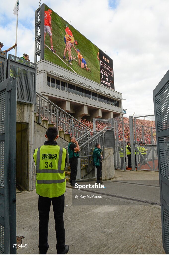 8 September 2013; Security staff watch the game on the big screen. GAA Hurling All-Ireland Senior Championship Final, Cork v Clare, Croke Park, Dublin. Picture credit: Ray McManus / SPORTSFILE