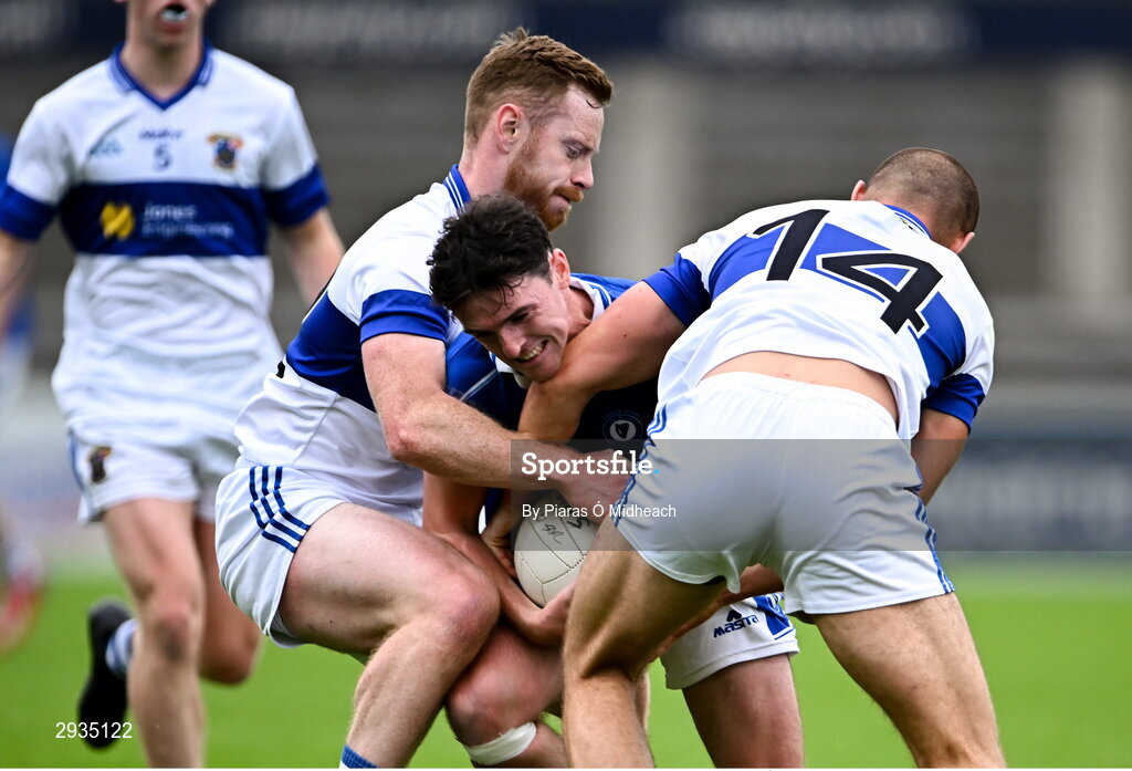 8 September 2024; Stephen Smith of Skerries Harps in action against James McCusker and Cian Dunne, 14, of St Vincent's during the Dublin County Senior 1 Club Football Championship Group 4 match between Skerries Harps and St Vincent's at Parnell Park in Dublin. Photo by Piaras Ó Mídheach/Sportsfile