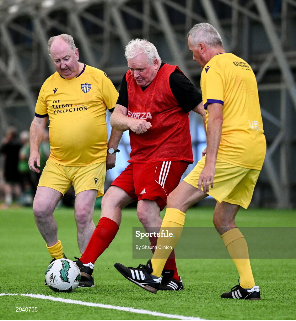 14 September 2024; Mike Tobin of Sligo Rovers in action against Peter Duffy, left, and Seán Keane of Wexford during the League of Ireland Walking Football Festival 2024 at the National Sports Indoor Centre in Dublin. Photo by Shauna Clinton/Sportsfile