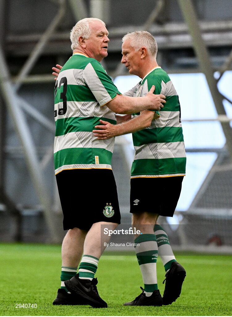 14 September 2024; Tommy McDonnell of Shamrock Rovers, left, is congratulated by team-mate Mick Crosbie after scoring a goal during the League of Ireland Walking Football Festival 2024 at the National Sports Indoor Centre in Dublin. Photo by Shauna Clinton/Sportsfile