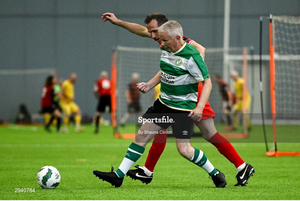 14 September 2024; Mick Crosbie of Shamrock Rovers in action against Anthony Hayde of Shelbourne during the League of Ireland Walking Football Festival 2024 at the National Sports Indoor Centre in Dublin. Photo by Shauna Clinton/Sportsfile