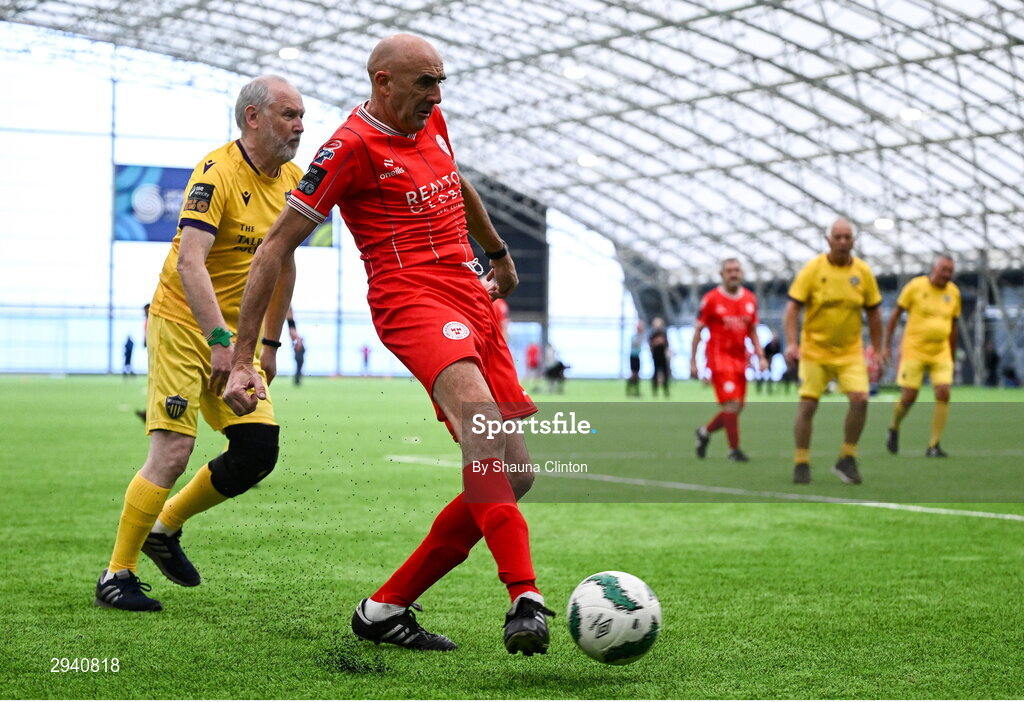 14 September 2024; Frank Darby of Shelbourne in action against Paddy Moran of Wexford during the League of Ireland Walking Football Festival 2024 at the National Sports Indoor Centre in Dublin. Photo by Shauna Clinton/Sportsfile