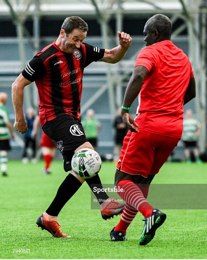14 September 2024; Gerry Black of Bohemians in action against Philip Eze of Sligo Rovers during the League of Ireland Walking Football Festival 2024 at the National Sports Indoor Centre in Dublin. Photo by Shauna Clinton/Sportsfile