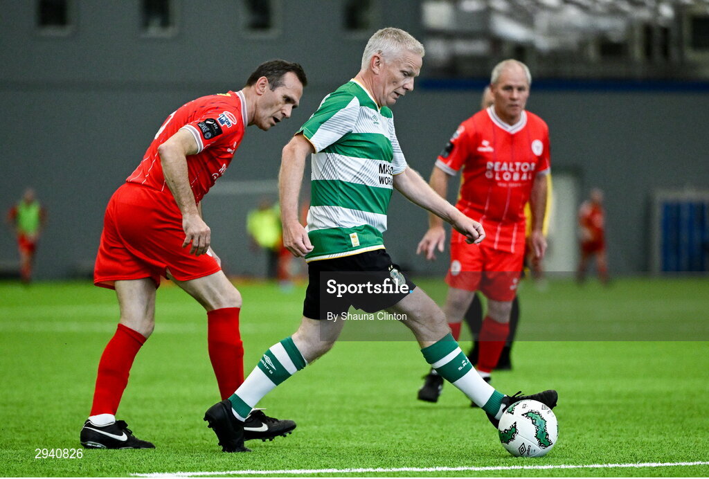 14 September 2024; Mick Crosbie of Shamrock Rovers in action against Anthony Hayde of Shelbourne during the League of Ireland Walking Football Festival 2024 at the National Sports Indoor Centre in Dublin. Photo by Shauna Clinton/Sportsfile