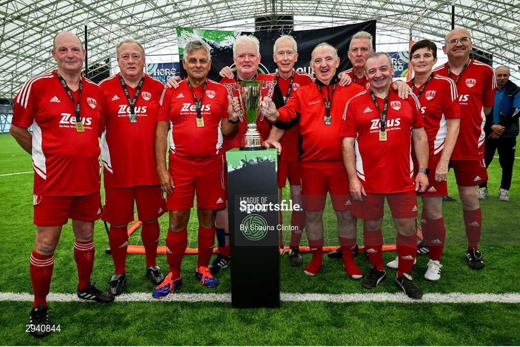 14 September 2024; The Cork City team with the trophy after the League of Ireland Walking Football Festival 2024 at the National Sports Indoor Centre in Dublin. Photo by Shauna Clinton/Sportsfile