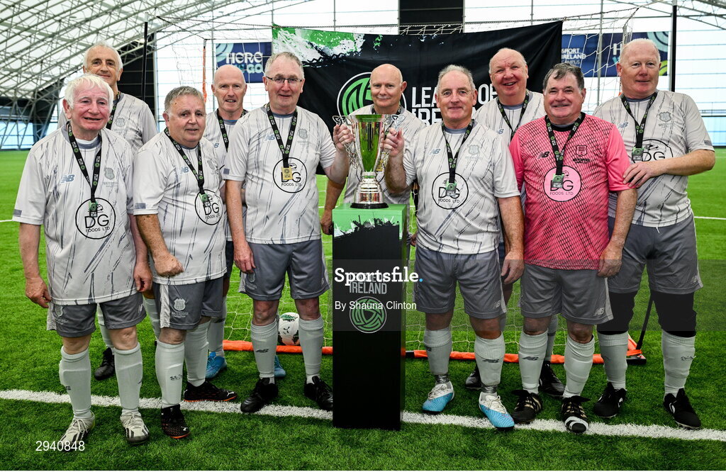 14 September 2024; The Waterford team with the trophy after the League of Ireland Walking Football Festival 2024 at the National Sports Indoor Centre in Dublin. Photo by Shauna Clinton/Sportsfile
