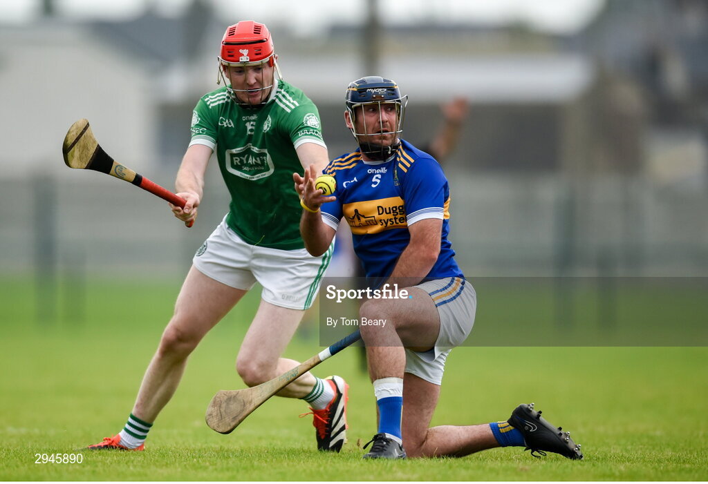 22 September 2024; Mark Carmody of Patrickswell is tackled by Phelim O'Reilly of Kilmallock during the Limerick County Senior Club Hurling Championship Group 1 match between Patrickswell and Kilmallock at Mick Neville Park in Rathkeale, Limerick. Photo by Tom Beary/Sportsfile