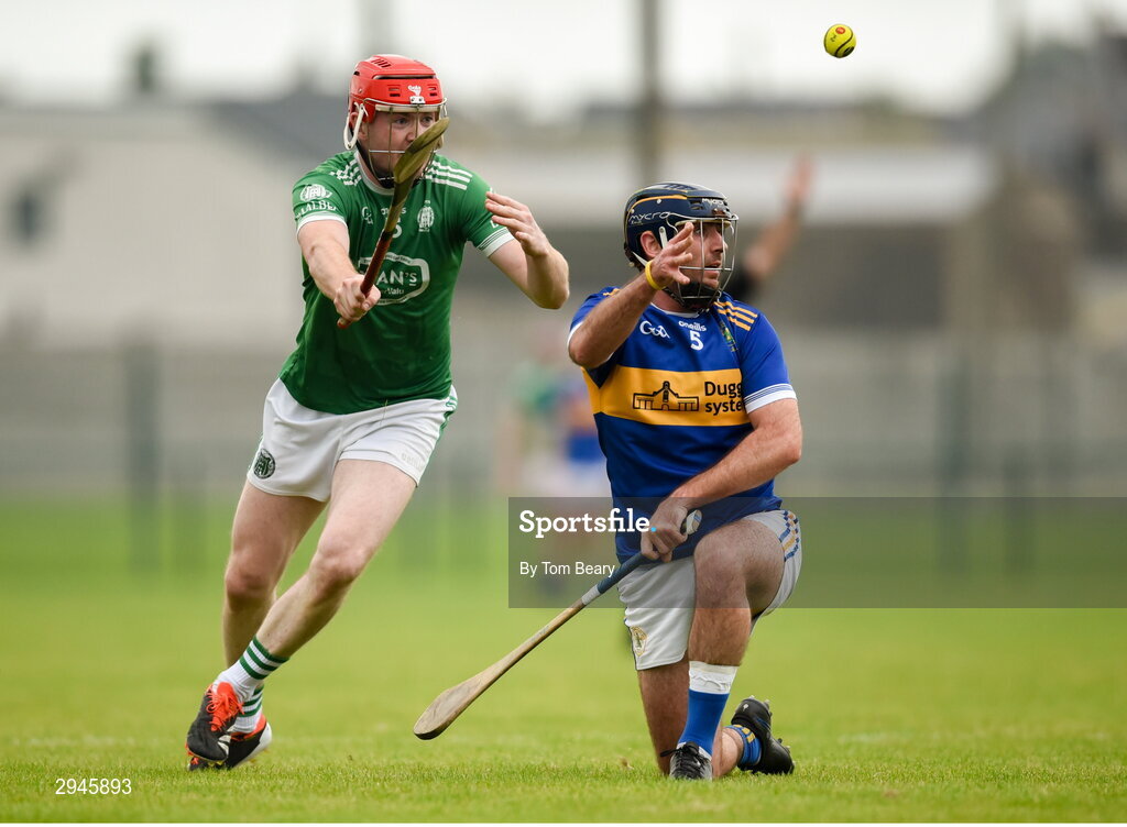 22 September 2024; Mark Carmody of Patrickswell is tackled by Phelim O'Reilly of Kilmallock during the Limerick County Senior Club Hurling Championship Group 1 match between Patrickswell and Kilmallock at Mick Neville Park in Rathkeale, Limerick. Photo by Tom Beary/Sportsfile
