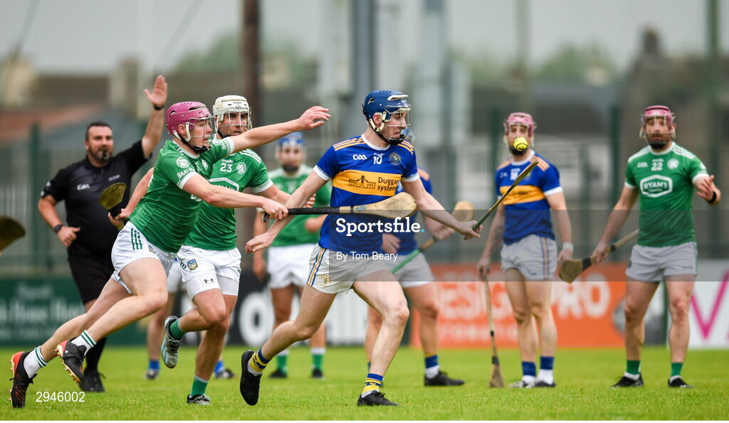 22 September 2024; Cian Gorman of Patrickswell  is tackled by Shane O'Brien of Kilmallock during the Limerick County Senior Club Hurling Championship Group 1 match between Patrickswell and Kilmallock at Mick Neville Park in Rathkeale, Limerick. Photo by Tom Beary/Sportsfile