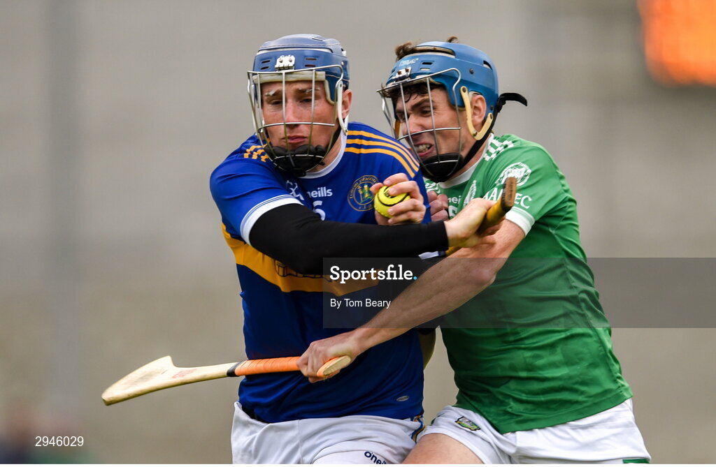 22 September 2024; Evan Fitzgerald of Patrickswell is tackled by Aaron Costello of Kilmallock during the Limerick County Senior Club Hurling Championship Group 1 match between Patrickswell and Kilmallock at Mick Neville Park in Rathkeale, Limerick. Photo by Tom Beary/Sportsfile