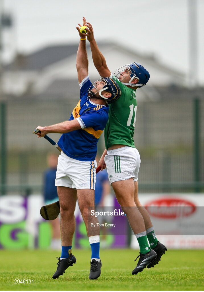 22 September 2024; Mark Carmody of Patrickswell in action against Pierce Connery of Kilmallock during the Limerick County Senior Club Hurling Championship Group 1 match between Patrickswell and Kilmallock at Mick Neville Park in Rathkeale, Limerick. Photo by Tom Beary/Sportsfile