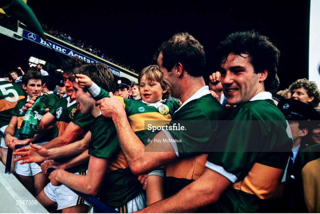22 September 1985; Kerry players, including Jack O'Shea with his son Aidan, celebrate after their side's victory in the All Ireland Football Championship Final match between Kerry and Dublin at Croke Park, Dublin. Photo by Ray McManus/Sportsfile