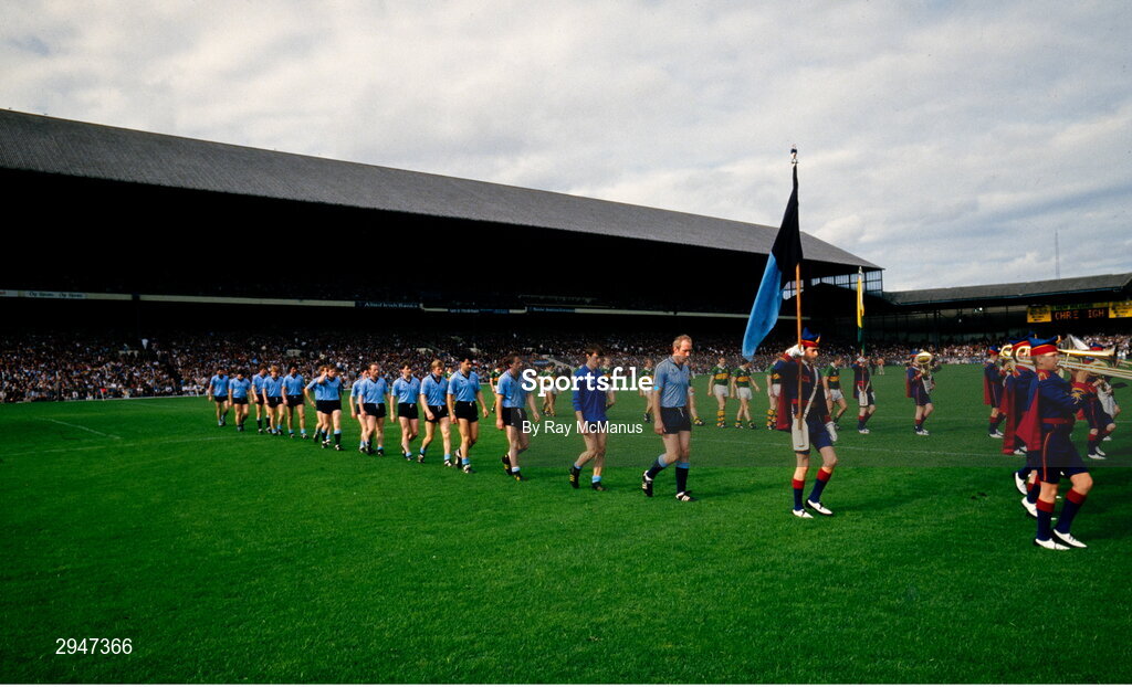 22 September 1985; Dublin captain Brian Mullins leads his team during the pre-match parade before the All Ireland Football Championship Final match between Kerry and Dublin at Croke Park, Dublin. Photo by Ray McManus/Sportsfile