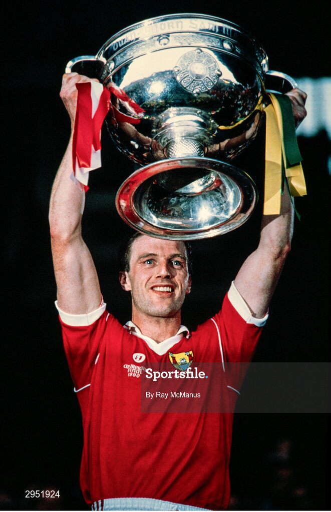 16 September 1990; Cork captain Larry Tompkins lifts the Sam Maguire cup after the All-Ireland Senior Football Championship final between Cork and Meath at Croke Park in Dublin. Photo by Ray McManus/Sportsfile