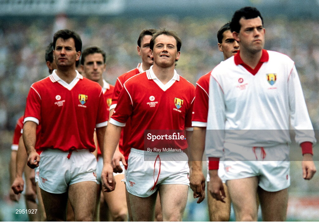 16 September 1990; Niall Cahalane of Cork, centre, walks alongside teammates, including Mick Slocum, Tony Nation and John Kerins, during the parade before the All-Ireland Senior Football Championship final between Cork and Meath at Croke Park in Dublin. Photo by Ray McManus/Sportsfile