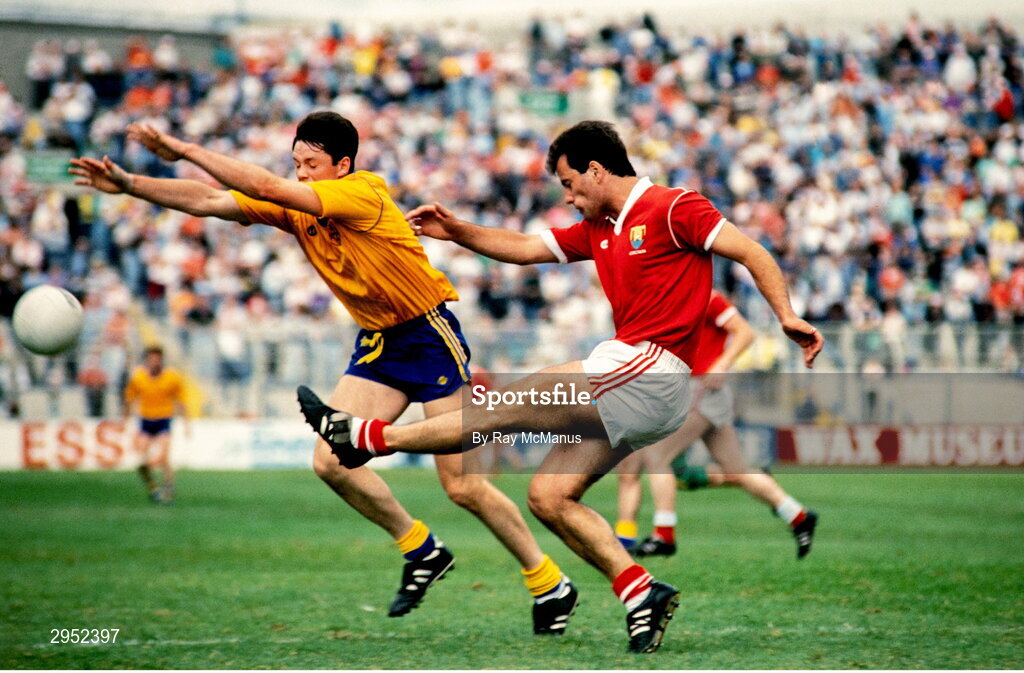 12 August 1990; Mick Slocum of Cork in action against John Newton of Roscommon during the All-Ireland Senior Football Championship Semi-Final match between Cork and Roscommon at Croke Park in Dublin. Photo by Ray McManus/Sportsfile