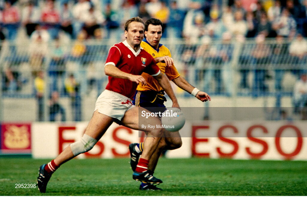 12 August 1990; Colm O'Neill of Cork in action against Des Newton of Roscommon during the All-Ireland Senior Football Championship Semi-Final match between Cork and Roscommon at Croke Park in Dublin. Photo by Ray McManus/Sportsfile