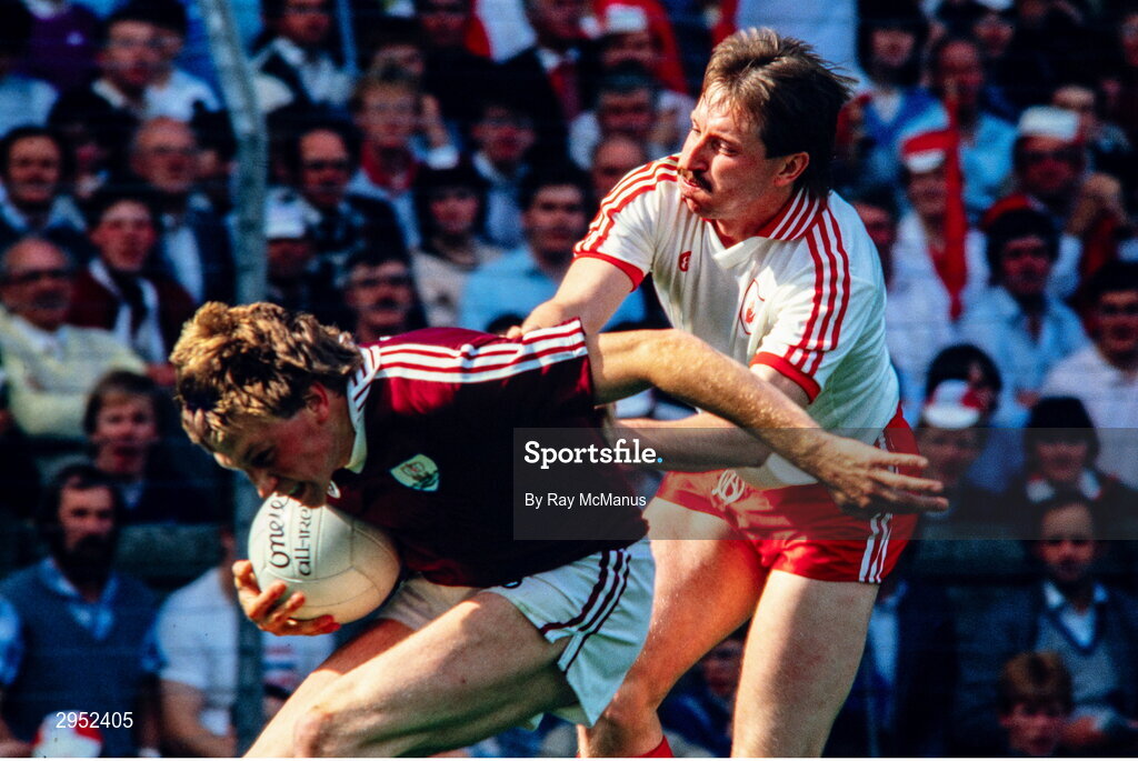 17 August 1986; Enda Guerin of Galway in action against Damien O'Hagan of Tyrone during the All-Ireland Senior Football Championship Semi-Final match between Tyrone and Galway at Croke Park in Dublin. Photo by Ray McManus/Sportsfile