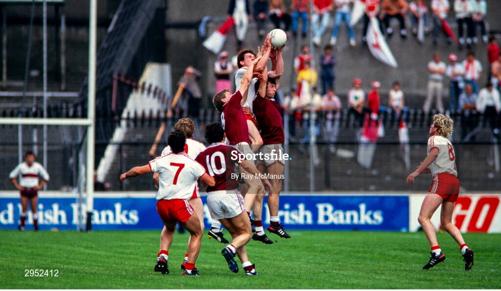 17 August 1986; Eugene McKenna of Tyrone contests a high ball with Galway players Brian Talty and Padraig Kelly during the All-Ireland Senior Football Championship Semi-Final match between Tyrone and Galway at Croke Park in Dublin. Photo by Ray McManus/Sportsfile