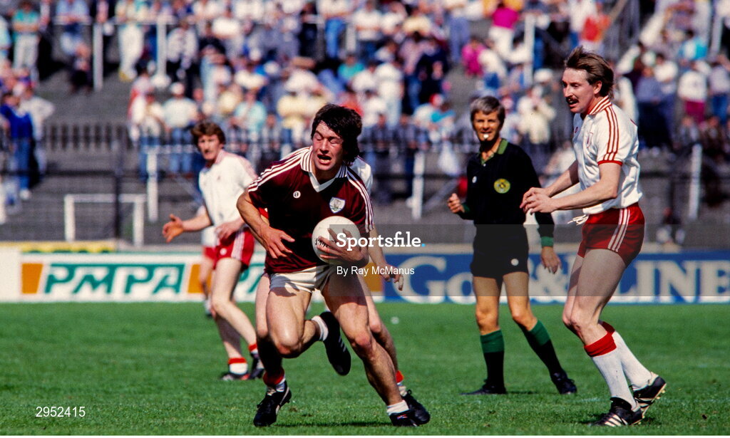 17 August 1986; Gay McManus of Galway in action against Damien O'Hagan of Tyrone during the All-Ireland Senior Football Championship Semi-Final match between Tyrone and Galway at Croke Park in Dublin. Photo by Ray McManus/Sportsfile