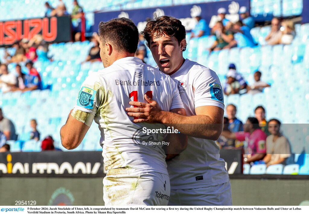 5 October 2024; Jacob Stockdale of Ulster, left, is congratulated by teammate David McCann for scoring a first try during the United Rugby Championship match between Vodacom Bulls and Ulster at Loftus Versfeld Stadium in Pretoria, South Africa. Photo by Shaun Roy/Sportsfile