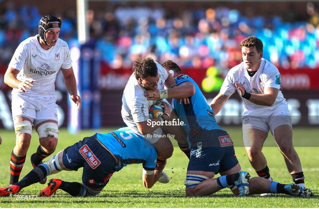 5 October 2024; Corrie Barrett of Ulster is tackled by Ruan Nortje and Cobus Wiese of Vodacom Bulls during the United Rugby Championship match between Vodacom Bulls and Ulster at Loftus Versfeld Stadium in Pretoria, South Africa. Photo by Shaun Roy/Sportsfile
