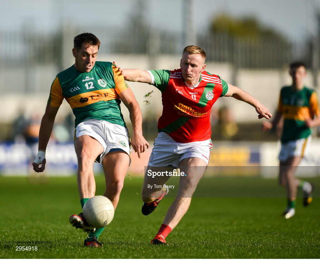 6 October 2024; Ed Finnegan of Rathvilly in action against Shane O'Neill of Palatine during the Carlow County Senior Football Championship final match between Rathvilly and Palatine at Netwatch Cullen Park in Carlow. Photo by Tom Beary/Sportsfile