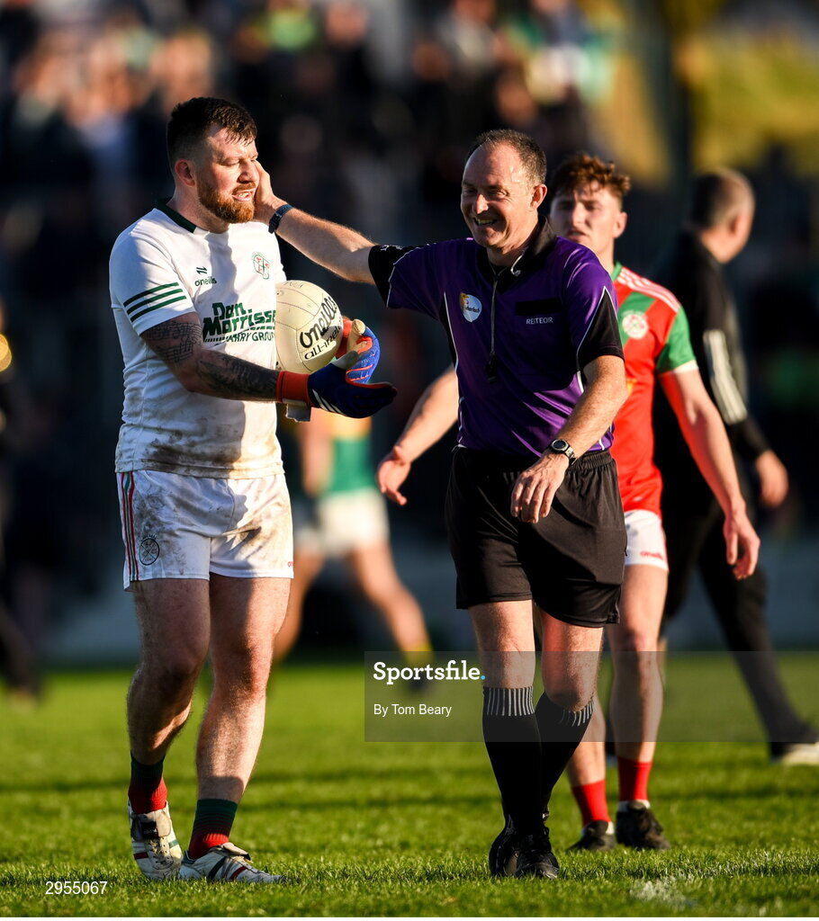 6 October 2024; Palatine goalkeeper Craig Kearney in conversation with referee John Hickey after the drawn Carlow County Senior Football Championship final match between Rathvilly and Palatine at Netwatch Cullen Park in Carlow. Photo by Tom Beary/Sportsfile
