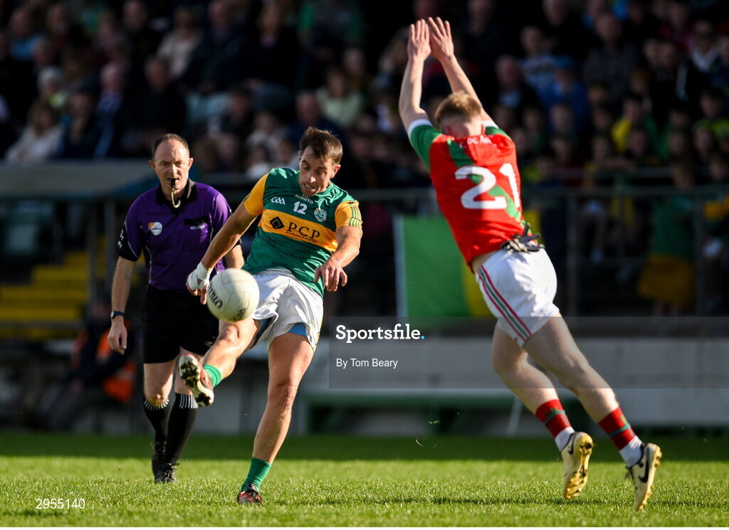 6 October 2024; Ed Finnegan of Rathvilly in action against Brandon Cassidy of Palatine during the Carlow County Senior Football Championship final match between Rathvilly and Palatine at Netwatch Cullen Park in Carlow. Photo by Tom Beary/Sportsfile