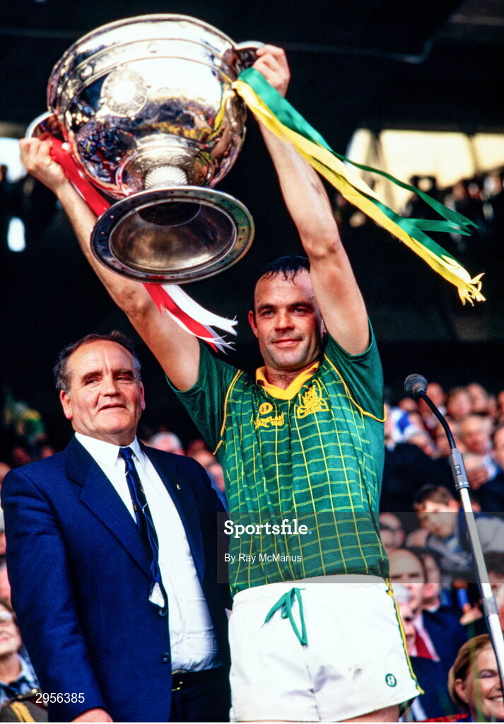 20 September 1987; Meath captain Mick Lyons lifts the Sam Maguire Cup alongside the Uachtarán Chumann Lúthchleas Gael  Dr Mick Loftus after the All-Ireland Senior Football Championship Final match between Meath and Cork at Croke Park in Dublin. Photo by Ray McManus/Sportsfile