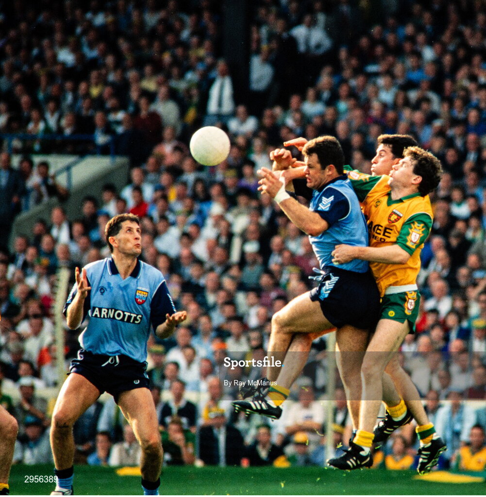 9 May 1993; Vinnie Murphy and Mick Galvin, left, of Dublin in action against Tony Boyle of Donegal during the Royal Liver Assurance National Football League Final Replay match between Dublin and Donegal at Croke Park in Dublin. Photo by Ray McManus/Sportsfile
