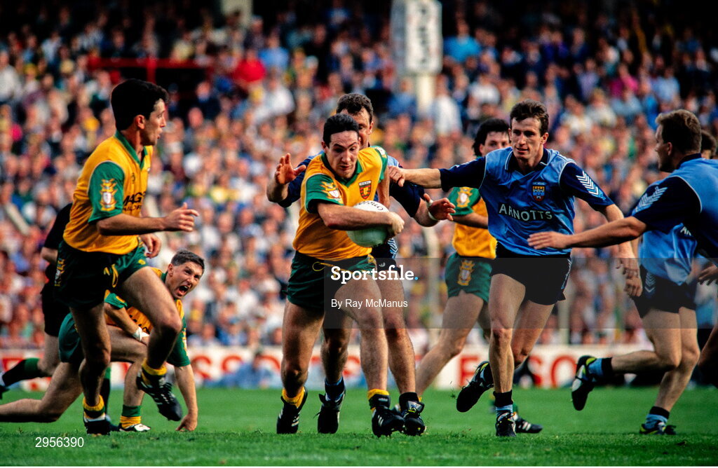 9 May 1993; Donal Reid of Donegal in action against Niall Guiden and Keith Barr, right, of Dublin during the Royal Liver Assurance National Football League Final Replay match between Dublin and Donegal at Croke Park in Dublin. Photo by Ray McManus/Sportsfile