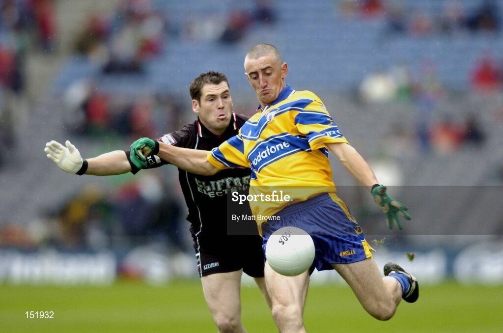 22 August 2004; Denis Russell, Clare, is tackled by John McPartland, Sligo. Tommy Murphy Cup Final, Clare v Sligo, Croke Park, Dublin. Picture credit; Matt Browne / SPORTSFILE