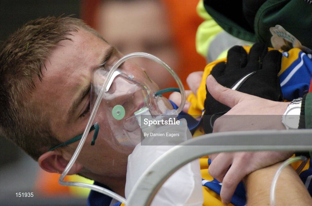 22 August 2004; Clare's Dara Blake is carried off the pitch after receiving an injury. Tommy Murphy Cup Final, Clare v Sligo, Croke Park, Dublin. Picture credit; Damien Eagers / SPORTSFILE