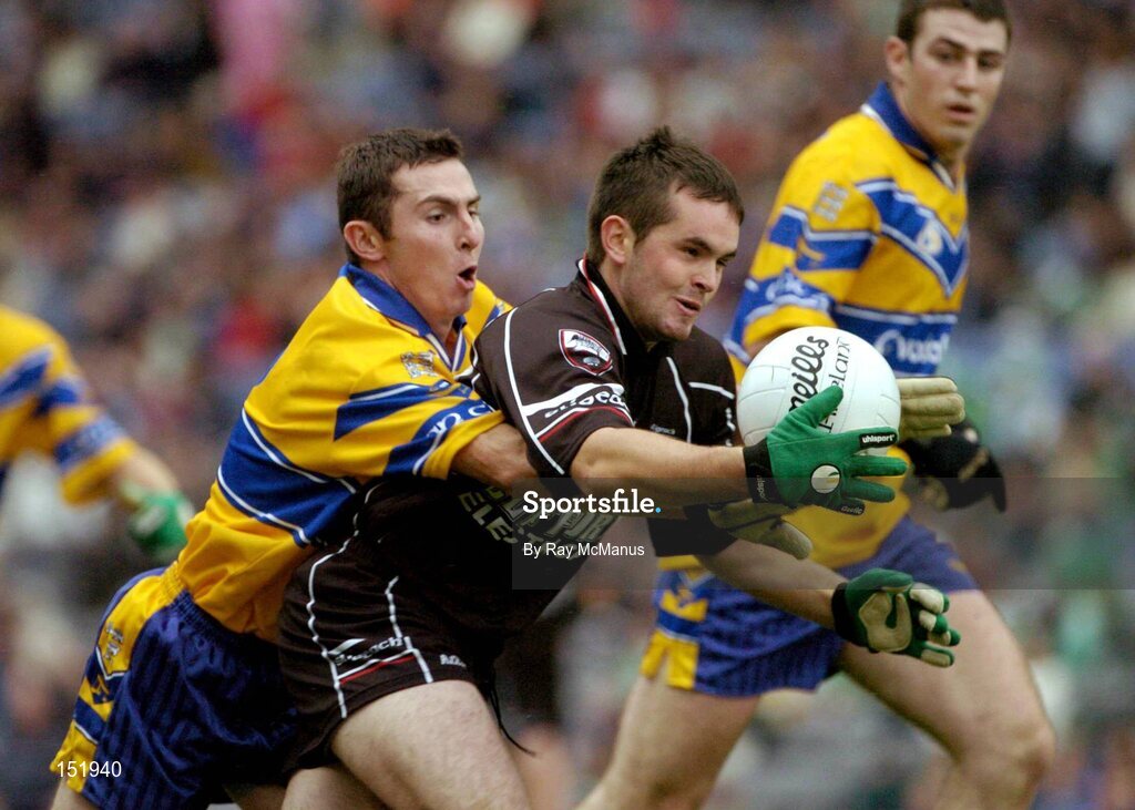 22 August 2004; David  Colleary, Sligo, is tackled by Clare's Alan Clohessy. Tommy Murphy Cup Final, Clare v Sligo, Croke Park, Dublin. Picture credit; Ray McManus / SPORTSFILE