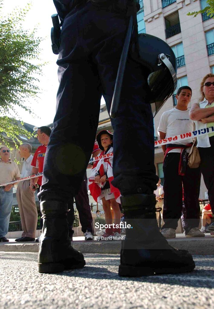 24 August 2004; An armed police officer stands guard outside the Riazor stadium as Shelbourne and Deportivo La Coruna supporters await the arrival of the two teams. UEFA Champions League, 3rd Round Second Leg Qualifier, Deportivo La Coruna v Shelbourne . La Coruna, Spain. Picture credit; David Maher / SPORTSFILE