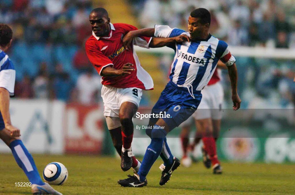 24 August 2004; Joseph Ndo, Shelbourne, in action against Mauro Silva, Deportivo La Coruna. UEFA Champions League, 3rd Round Second Leg Qualifier, Deportivo La Coruna v Shelbourne, Riazor stadium. La Coruna, Spain. Picture credit; David Maher / SPORTSFILE