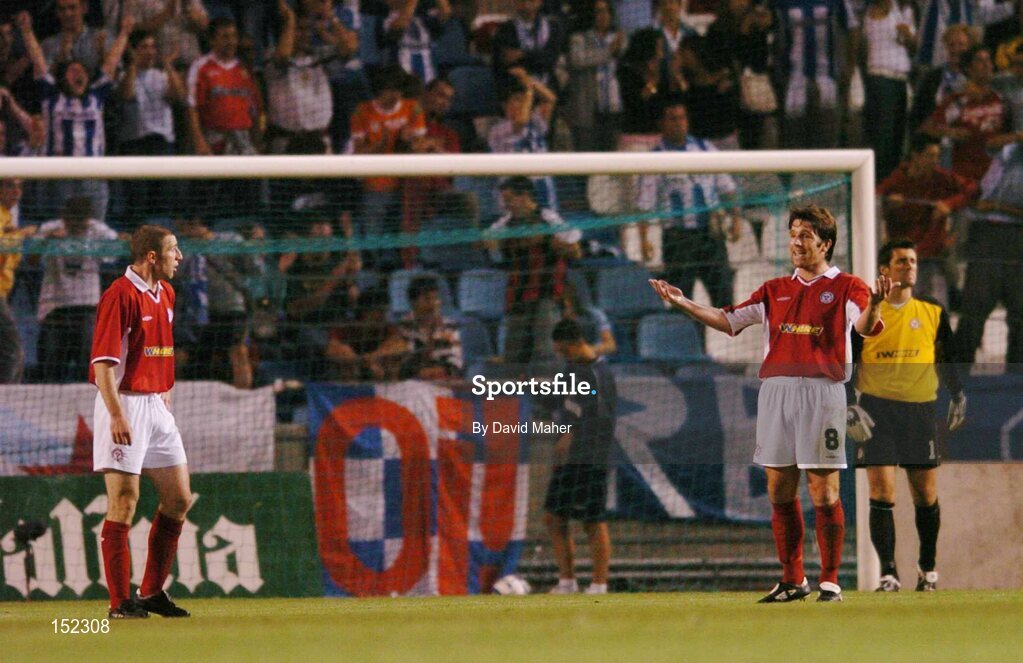 24 August 2004; Shelbourne players left to right, Owen Heary, Stuart Byrne and goalkeeper Steve Williams look on after Victor Sandrez, Deportivo La Coruna, had scored his sides second goal. UEFA Champions League, 3rd Round Second Leg Qualifier, Deportivo La Coruna v Shelbourne, Riazor stadium. La Coruna, Spain. Picture credit; David Maher / SPORTSFILE
